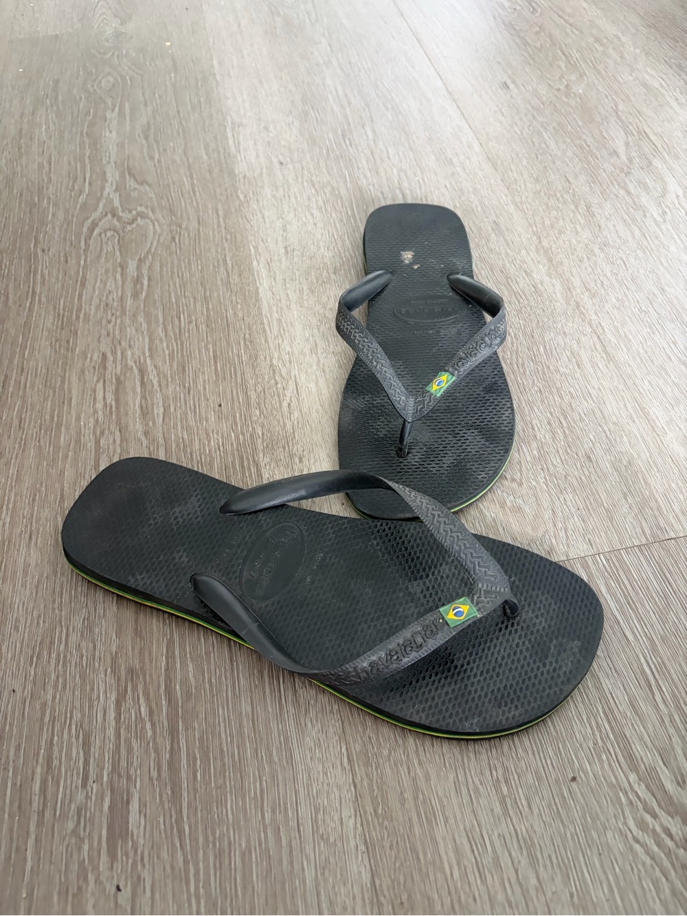 Havaianas Black Flip Flops with Green Accent